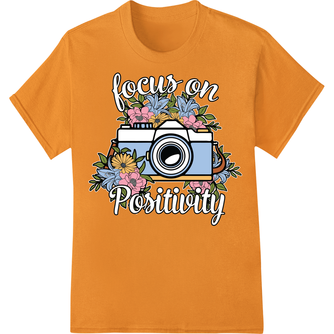 Vintage Camera Floral 'Focus on Positivity' DTF Print on orange shirt - SUPERDTF-DTF Prints-DTF Transfers-Custom DTF Prints