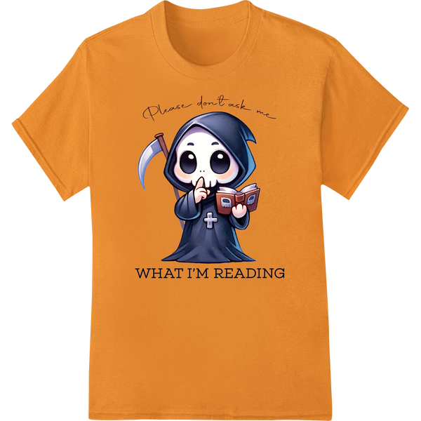 Adorable Grim Reaper Lost in a Book - Quirky DTF Print on orange shirt - SUPERDTF-DTF Prints-DTF Transfers-Custom DTF Prints