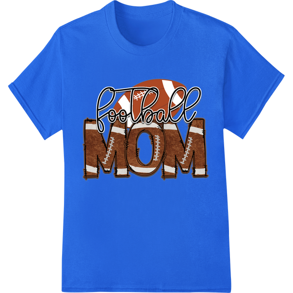 Stylized text design reading 'Football Mom' in bold letters with an American football graphic, suitable for heat transfer on...