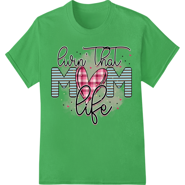 A cartoon design with the quote 'Livin' That Mom Life' in a fun font surrounded by floral accents, suitable for mother's day...