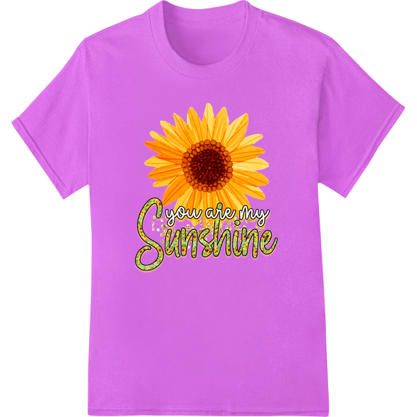 Uplifting sunflower heat transfer design with a bright yellow sunflower and green leaves on a white background