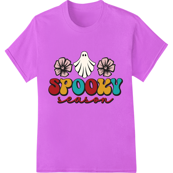 A spooky ghost surrounded by flowers on a colorful background, perfect for Halloween and fall DTF heat transfers.