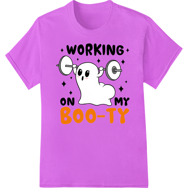 Black t-shirt with pumpkin illustration and 'Working on My Boo-ty' Halloween fitness phrase in distressed text design.