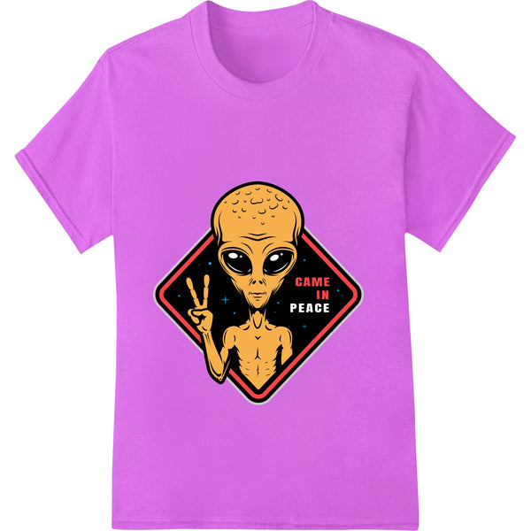 Retro-styled alien character flashing a peace sign in orange and black - a vibrant DTF print design for custom apparel