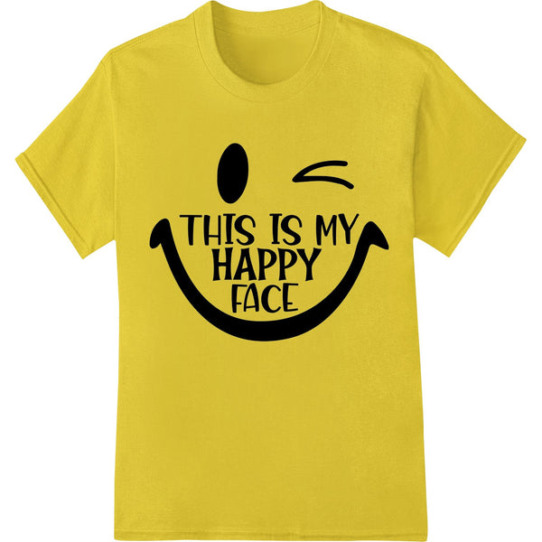 Minimalist black smiley face design with the text 'This Is My Happy Face' in a bold font, suitable for DTF heat transfer...