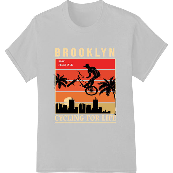 Colorful illustration of a BMX cyclist performing a stunt trick against a gritty urban background with the words 'Brooklyn...