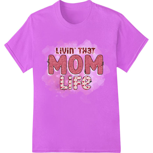 Playful and stylish black and white text design with the phrase 'Livin' that MOM Life' in a decorative font.