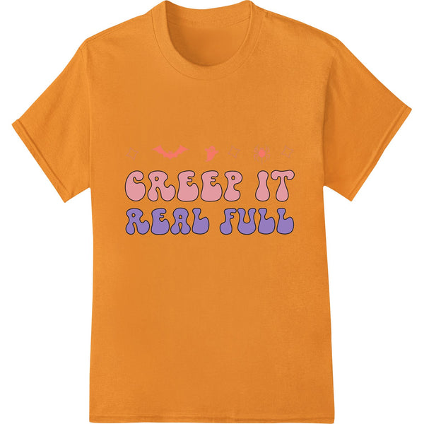 Spooky black and orange 'Creep It Real Full' Halloween themed typography design, perfect for direct-to-film printing on...