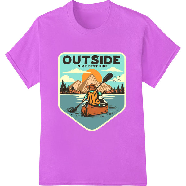 Colorful DTF print design featuring mountains, trees, and the text 'Outside Is My Best Side' on a bright background