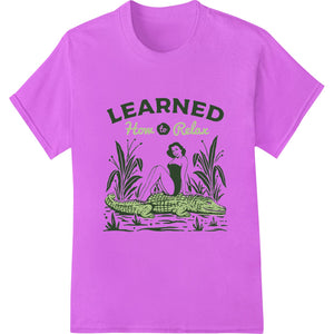 Colorful direct to film heat transfer design featuring a relaxed crocodile character with the text 'Learned How To Relax'