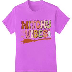 Black and white illustration of a witch wearing a hat with moons and stars, holding a broomstick with the text 'Witchy Vibes'